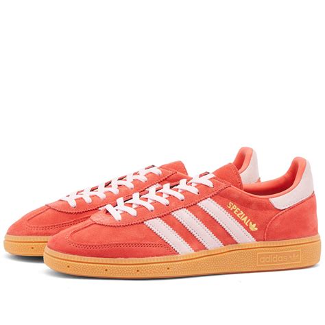 red and pink adidas spezial.